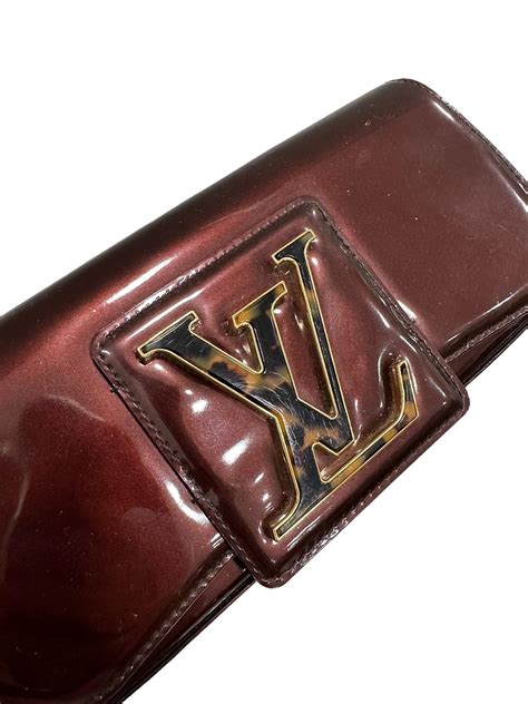 louis vuitton sobe clutch price|louis vuitton used clutch.